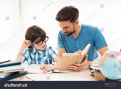 stock-photo-father-helps-his-son-to-do-homework-in-school-he-suggests-how-to-do-it-right-they-are-in-a-good-750764722